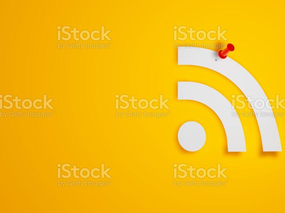 Pin Paper RSS Symbol on Yellow Background